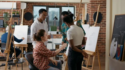 Students painting in an art class