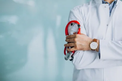 Medical professional holding a stethoscope