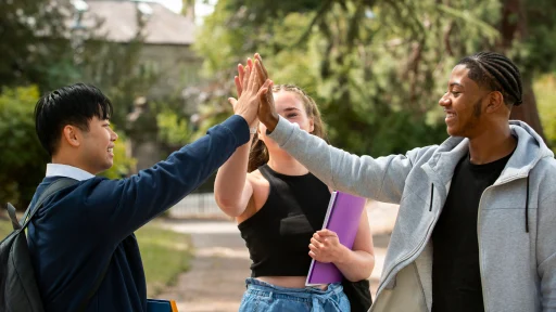 Students giving a high five